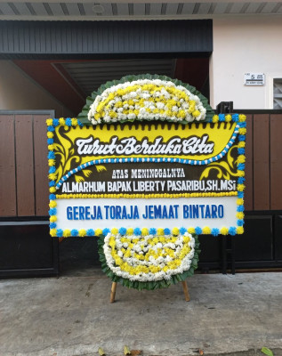 Papan Bunga Duka di Lembah Damai